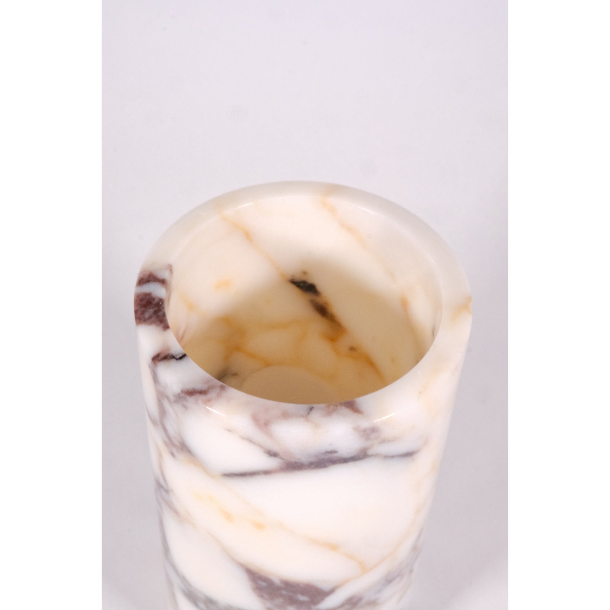 Close-up of Calacatta Viola marble texture highlighting deep violet and cream veining details