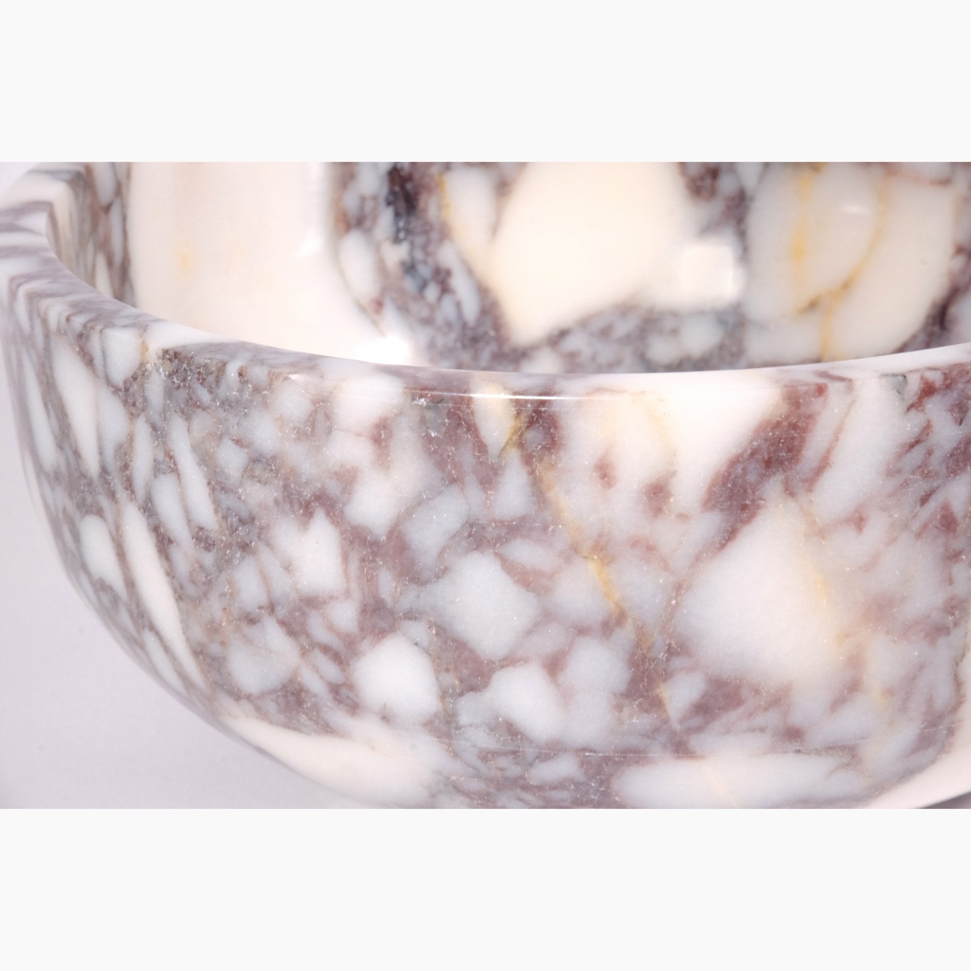 Close-up of Calacatta Viola marble texture highlighting fine craftsmanship and elegant surface polish.