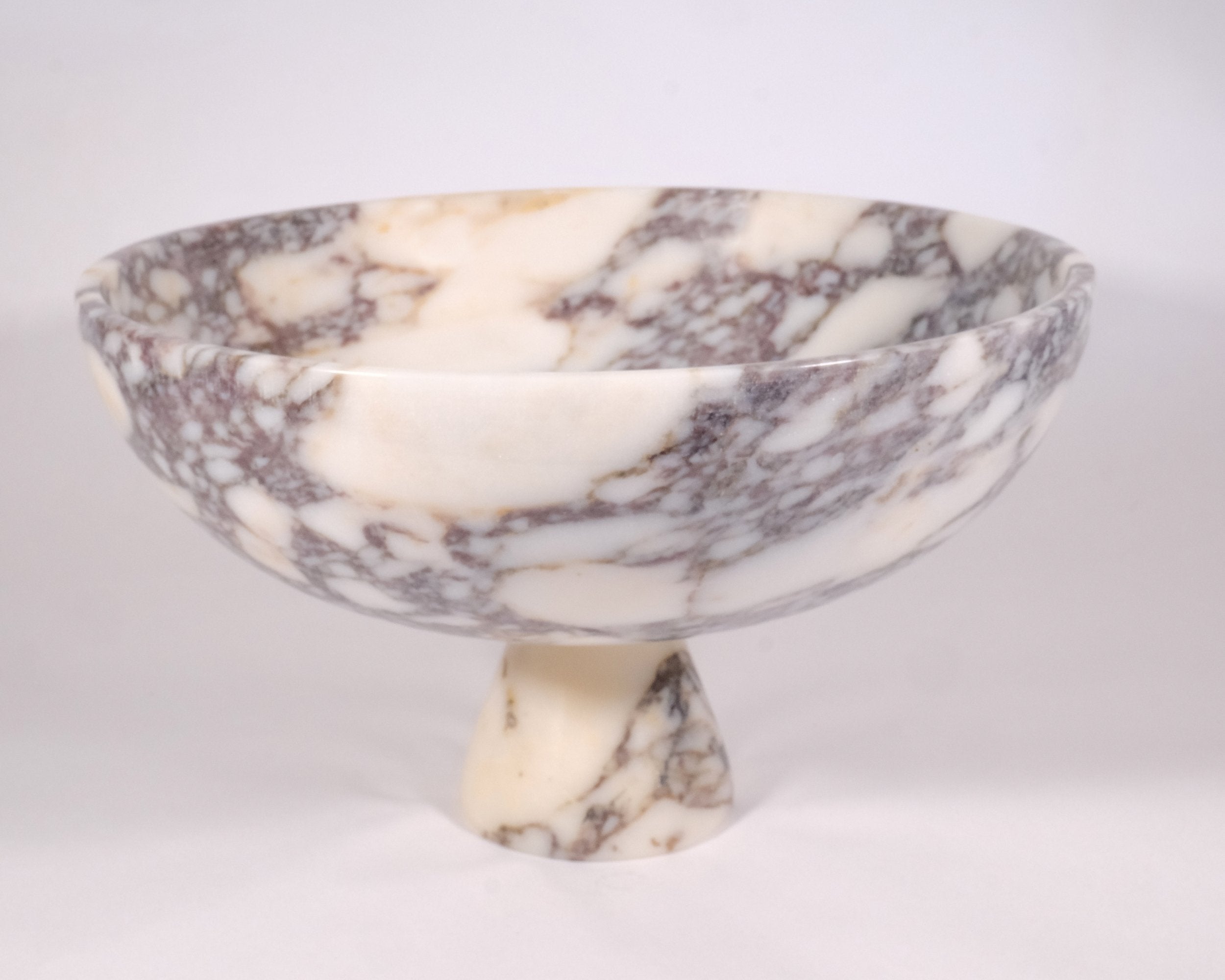 Veined Calacatta Viola marble pedestal bowl on white background – luxury handcrafted centerpiece by Petra Vera.