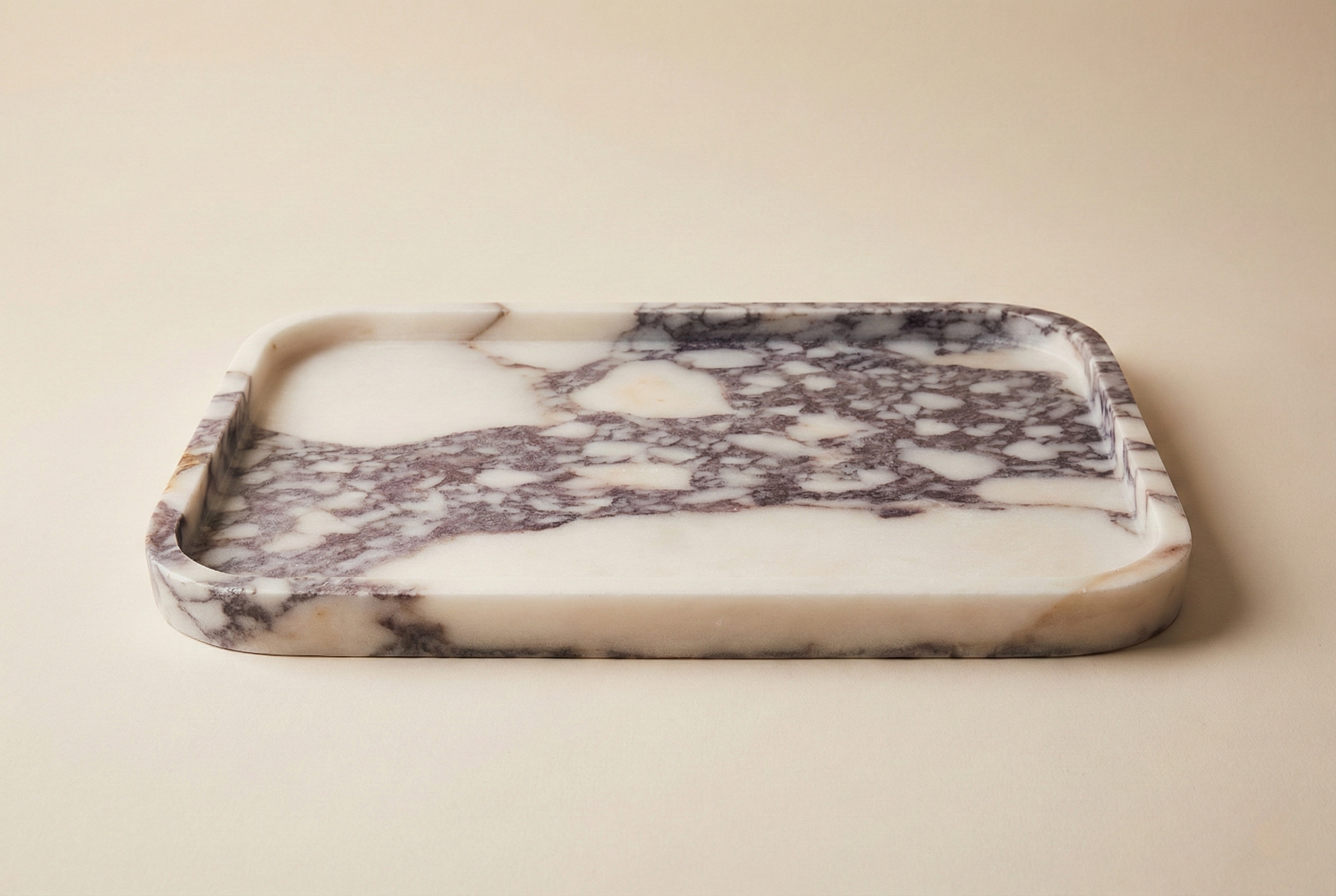 Calacatta Viola marble tray with soft violet veining on a clean white background.