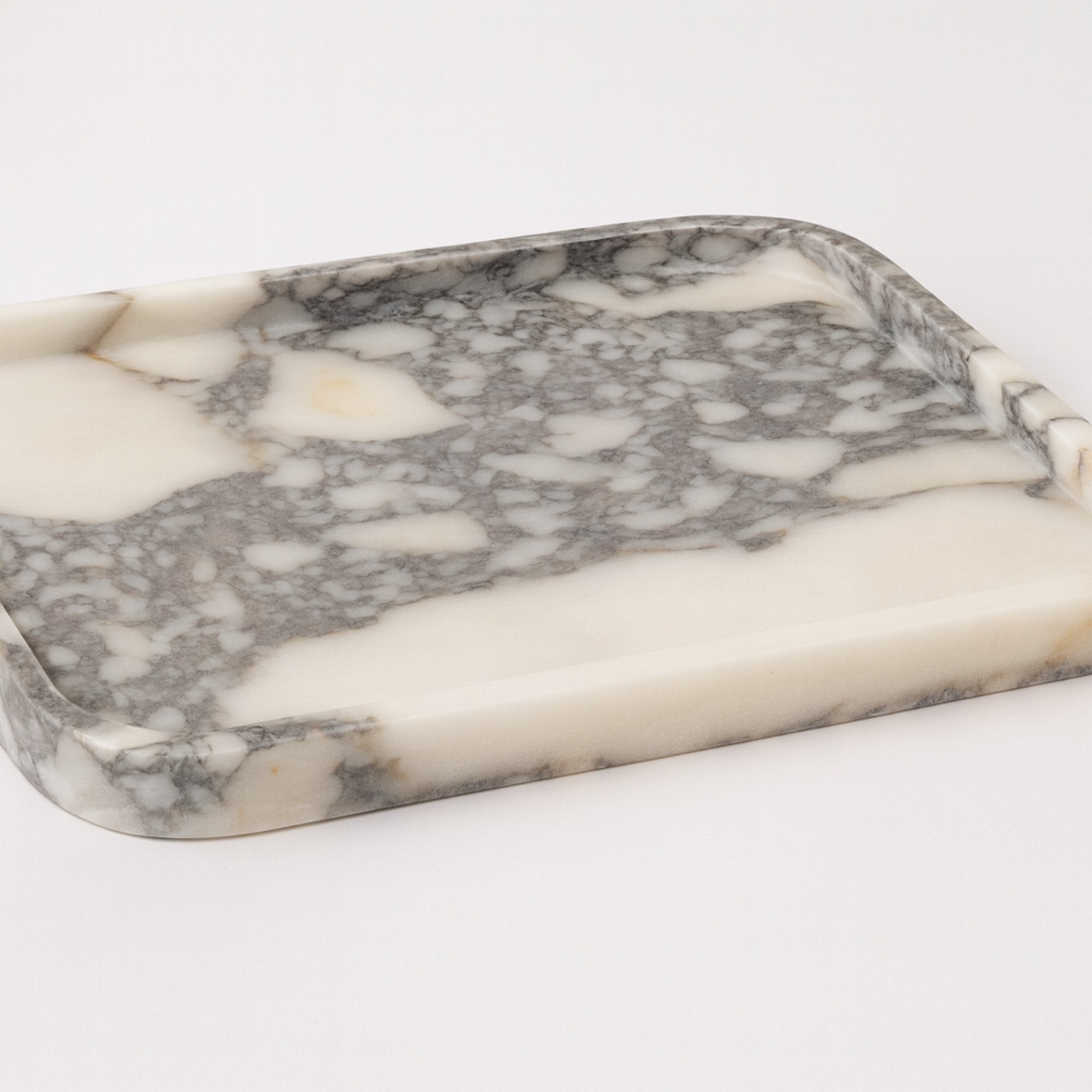 Calacatta Viola marble tray with soft violet veining on a clean white background.