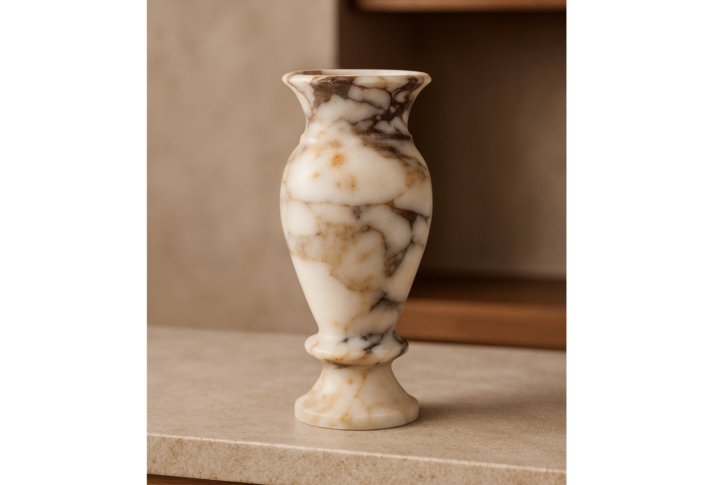 Calacatta Viola marble vase styled on wooden console table – warm interior home styling