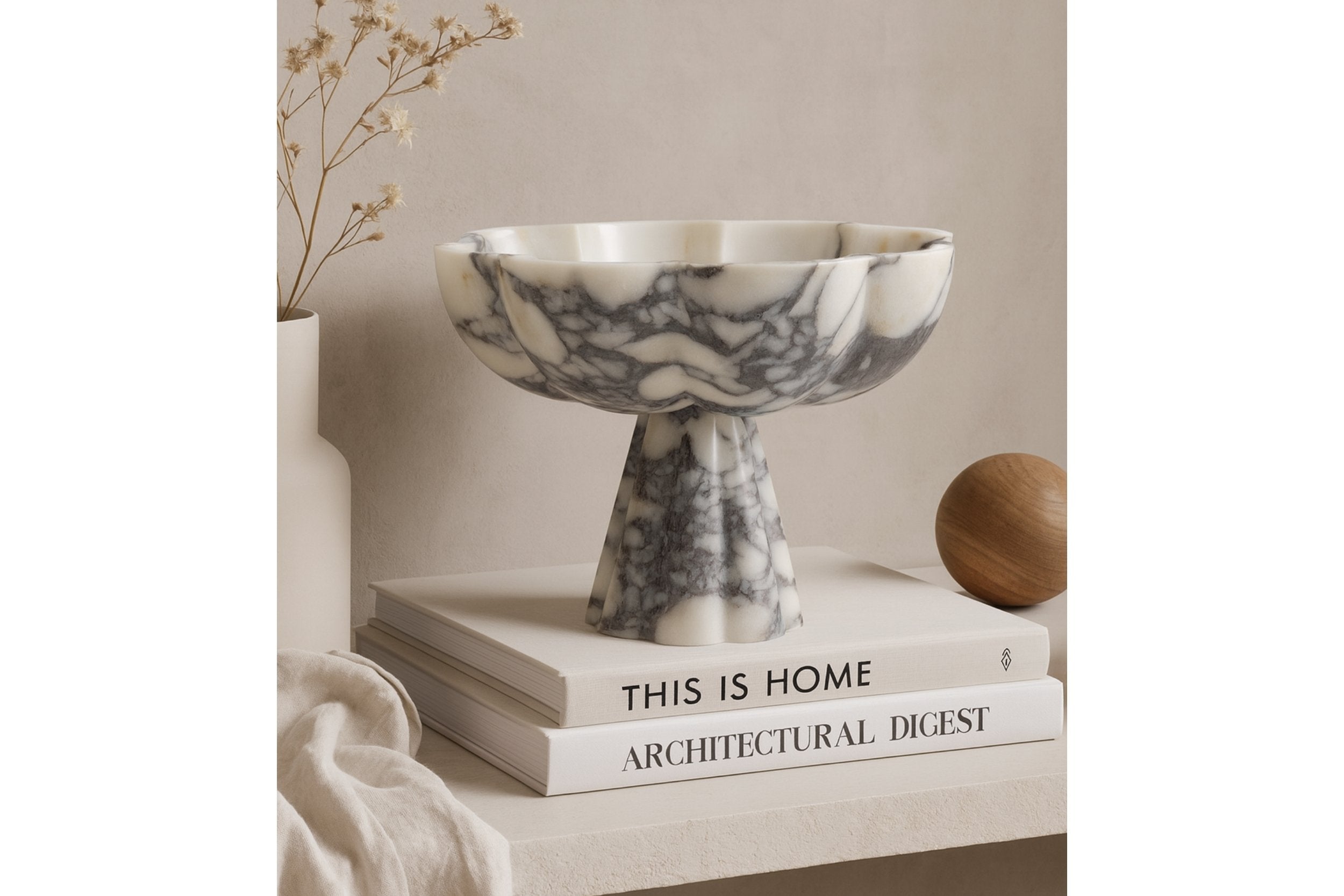 Calacatta Viola footed bowl on console table, warm neutral decor