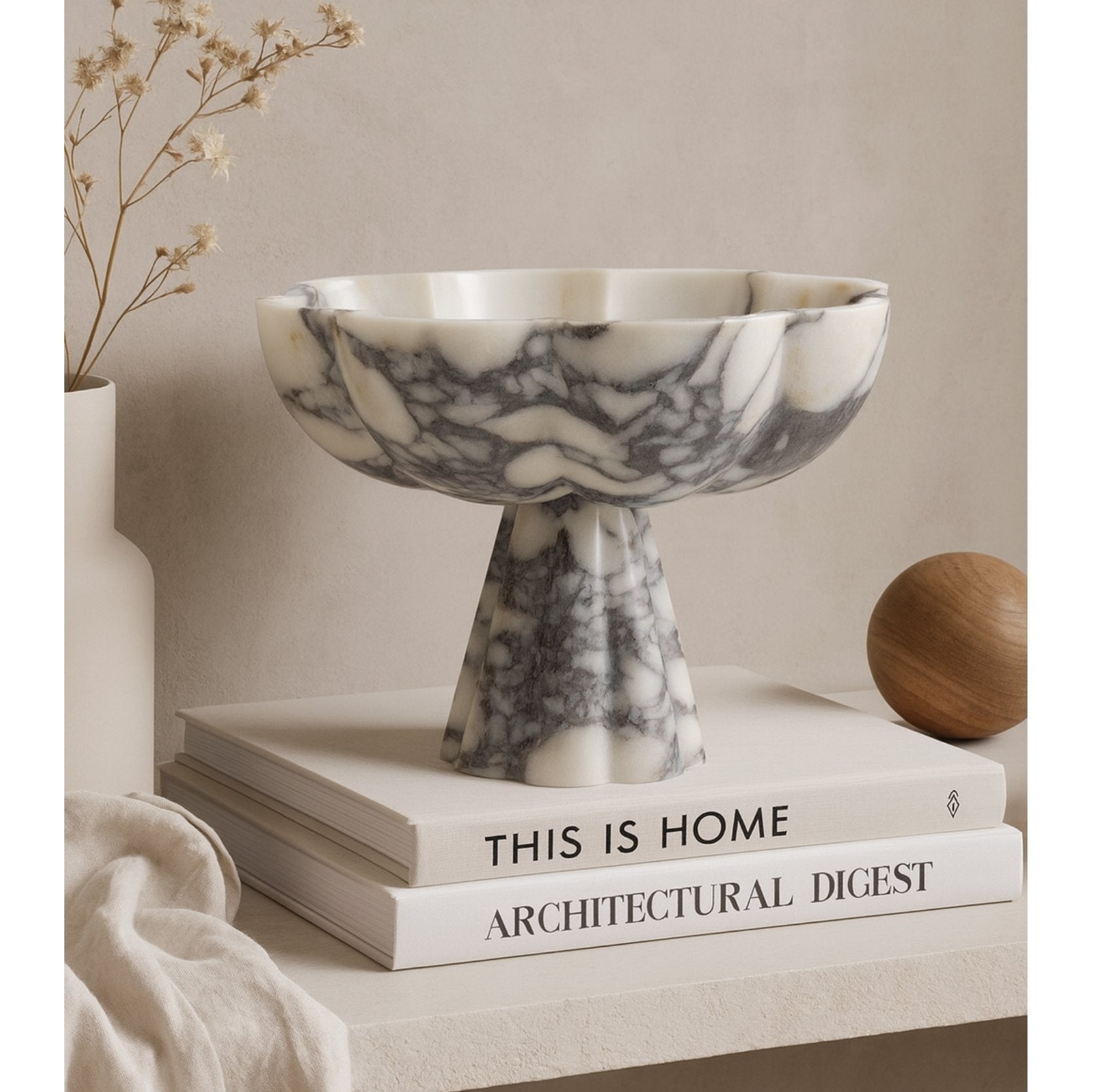 Calacatta Viola footed bowl on console table, warm neutral decor