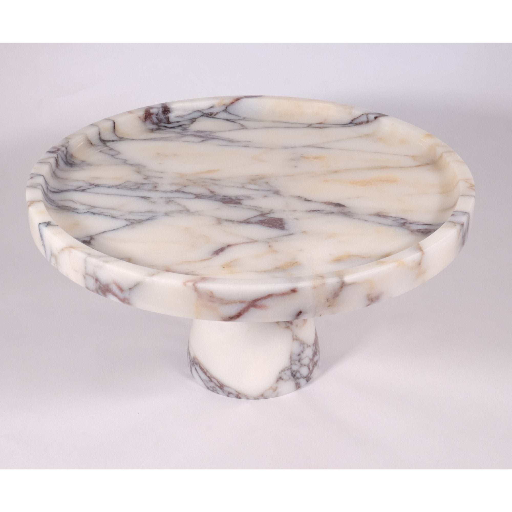 Top view of Calacatta Viola marble serving bowl showing natural veining and rounded rim, perfect for desserts or fruit