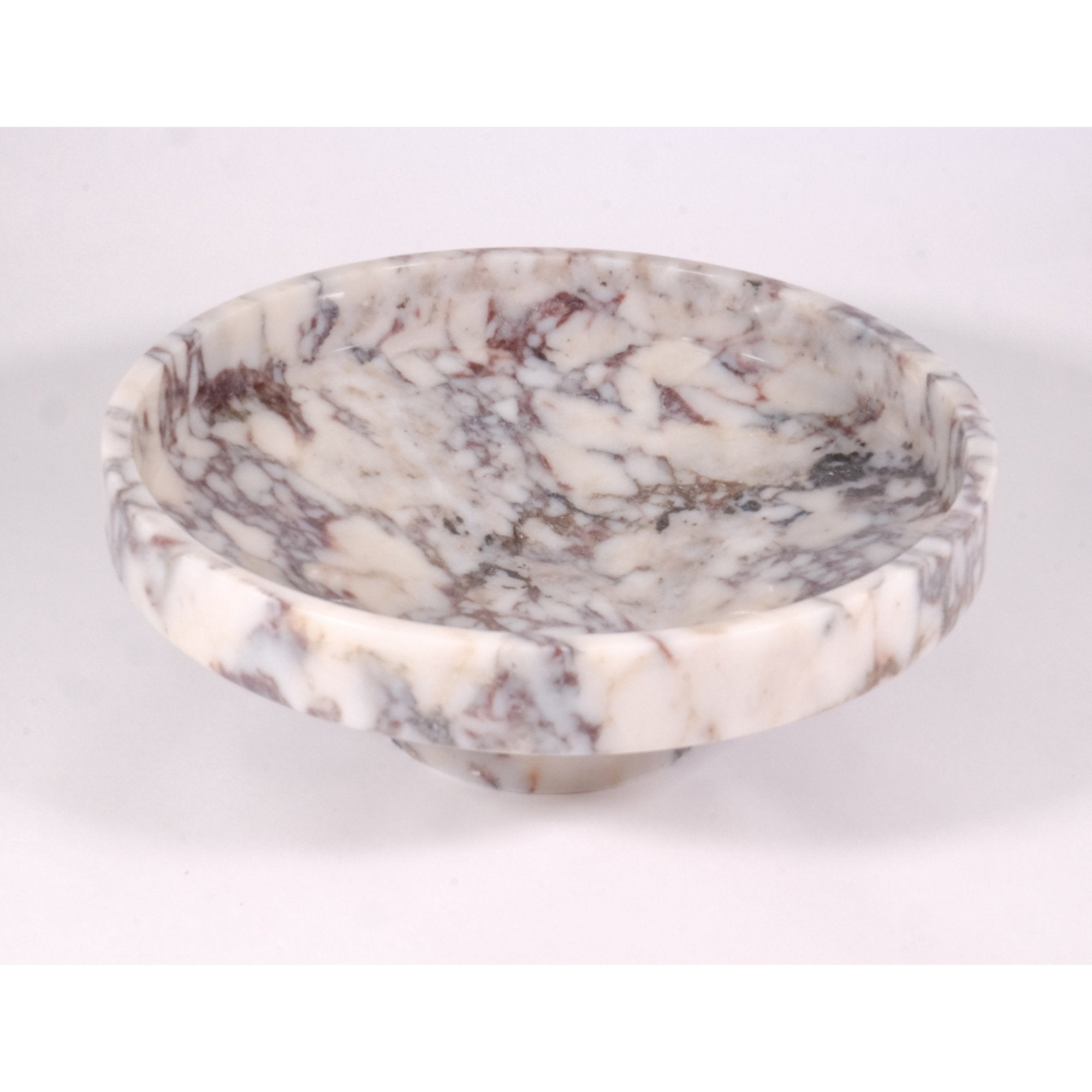 Top view of Calacatta Viola marble bowl showing unique veining patterns and smooth polished interior.