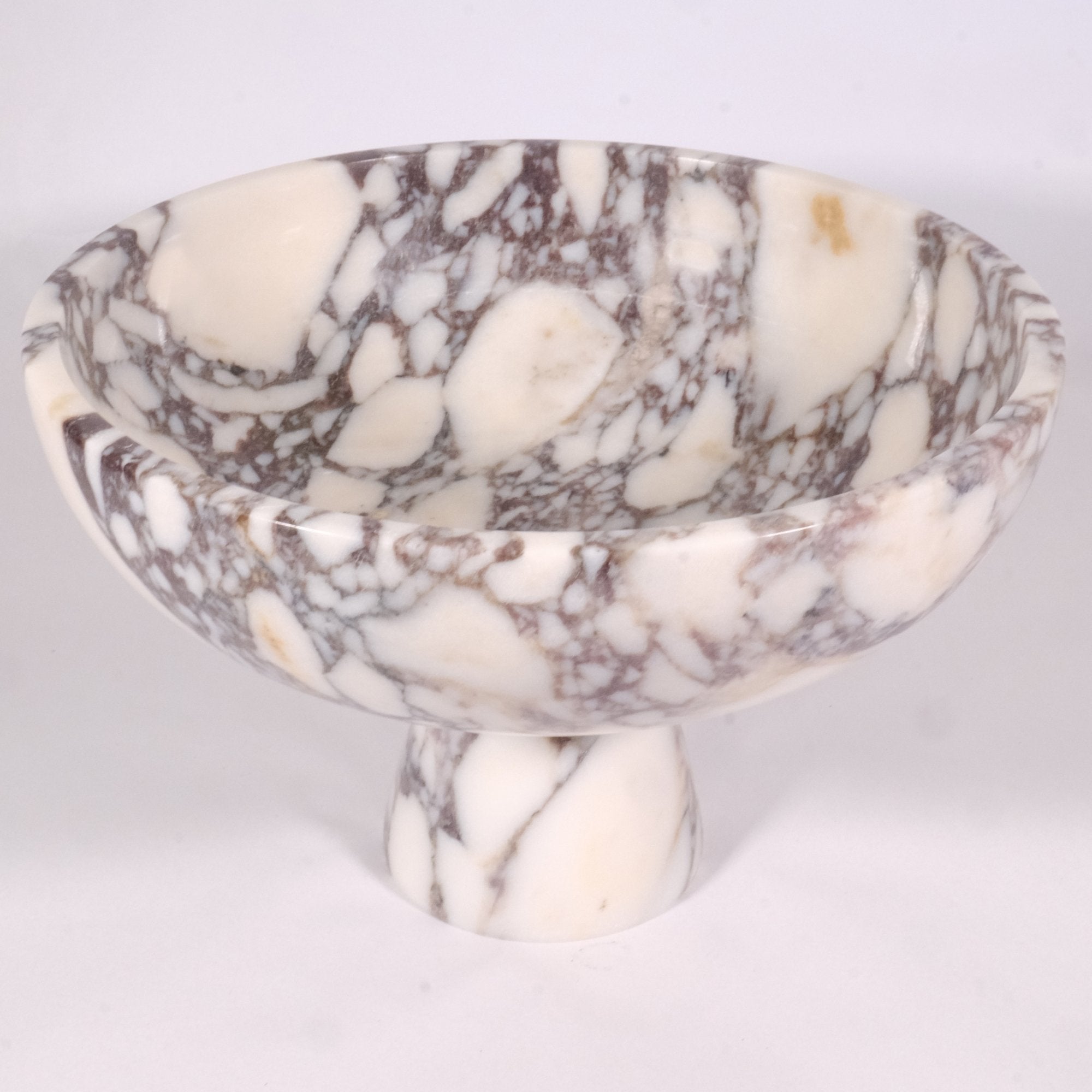 top view of calacatta viola marble pedestal bowl showing natural violet veining and polished interior surface