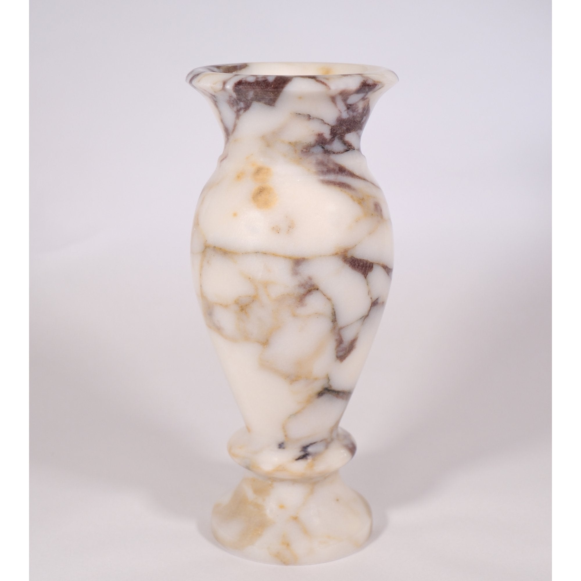 Elegant Calacatta Viola marble vase showing natural veining and smooth finish