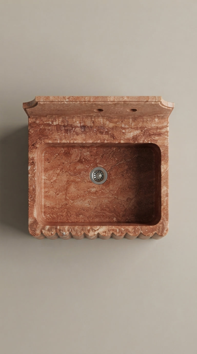 Top view of Red Travertine bathroom sink showing rectangular basin, drain and decorative backsplash
