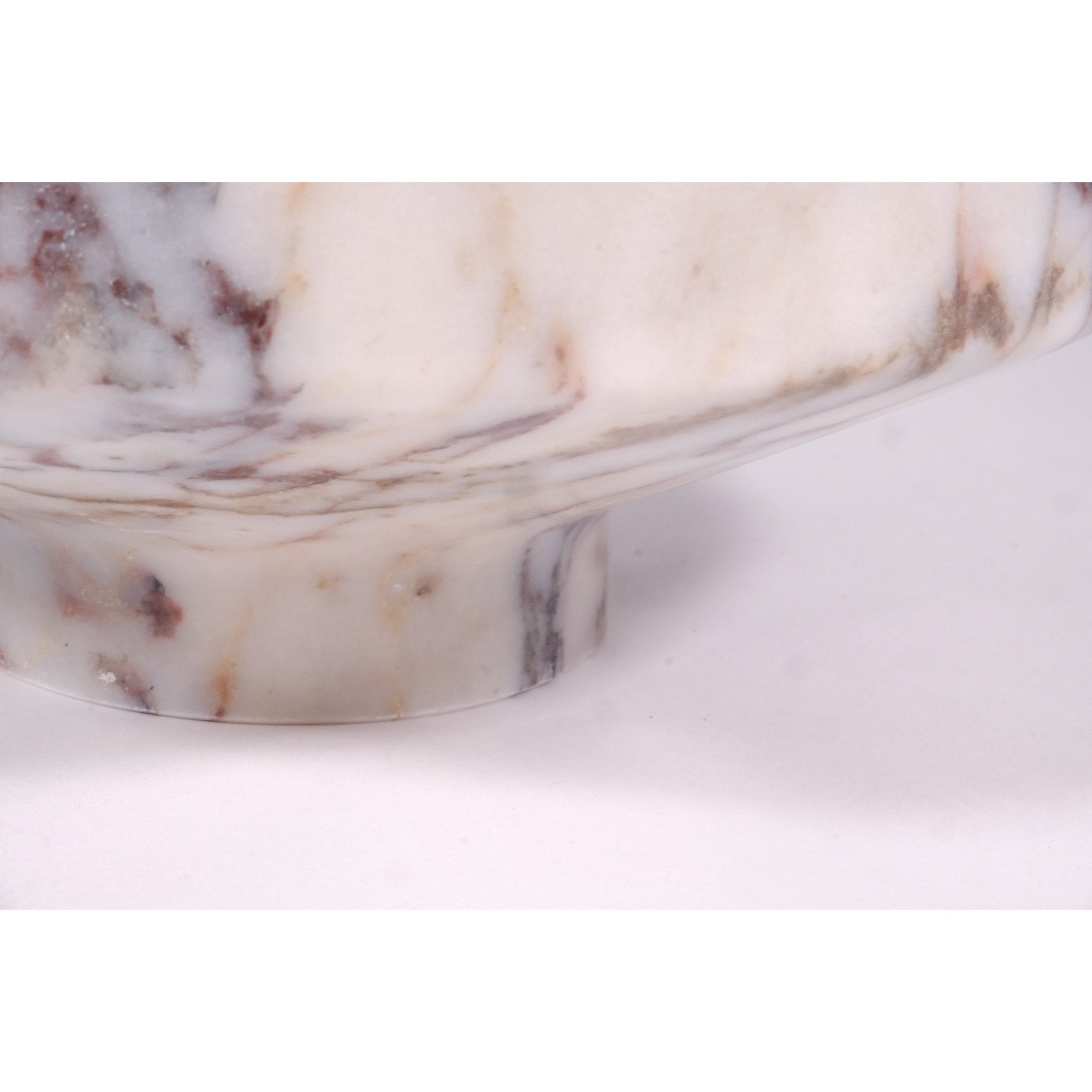 Macro shot of Calacatta Viola marble veins in rich plum and taupe tones.