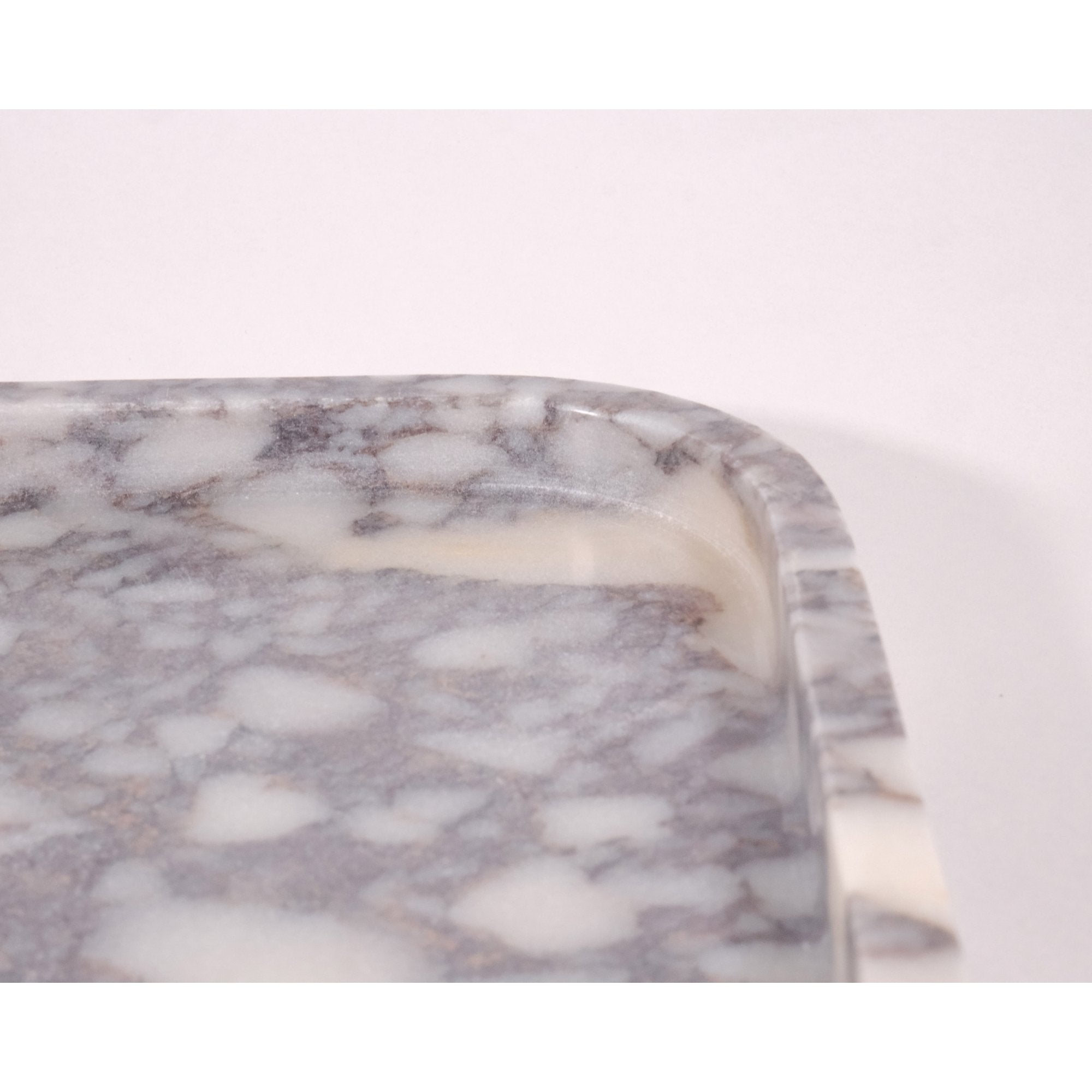 Detailed close-up of Calacatta Viola marble tray highlighting texture and craftsmanship.