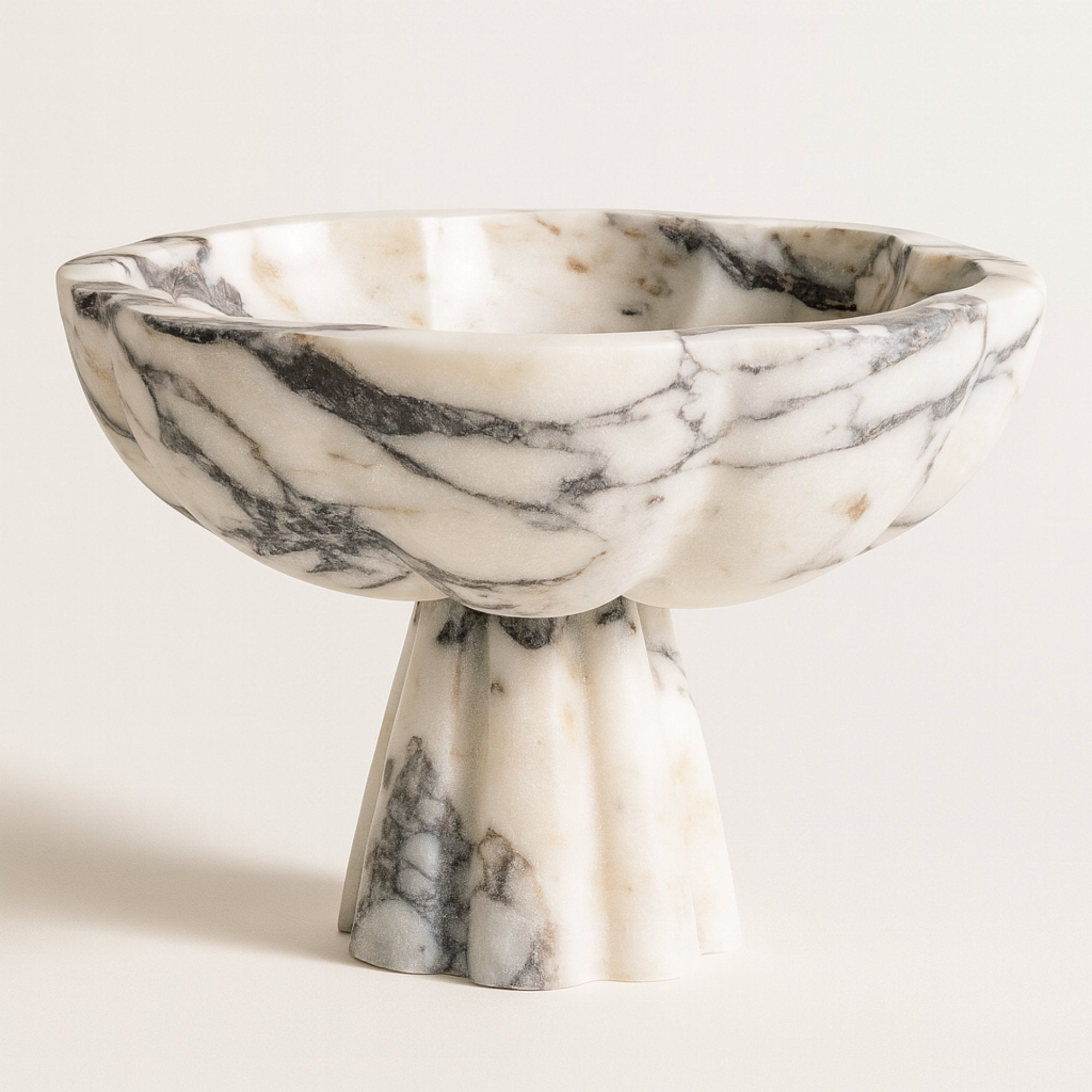 Calacatta Viola marble pedestal bowl — hero view on neutral background — Petra Vera