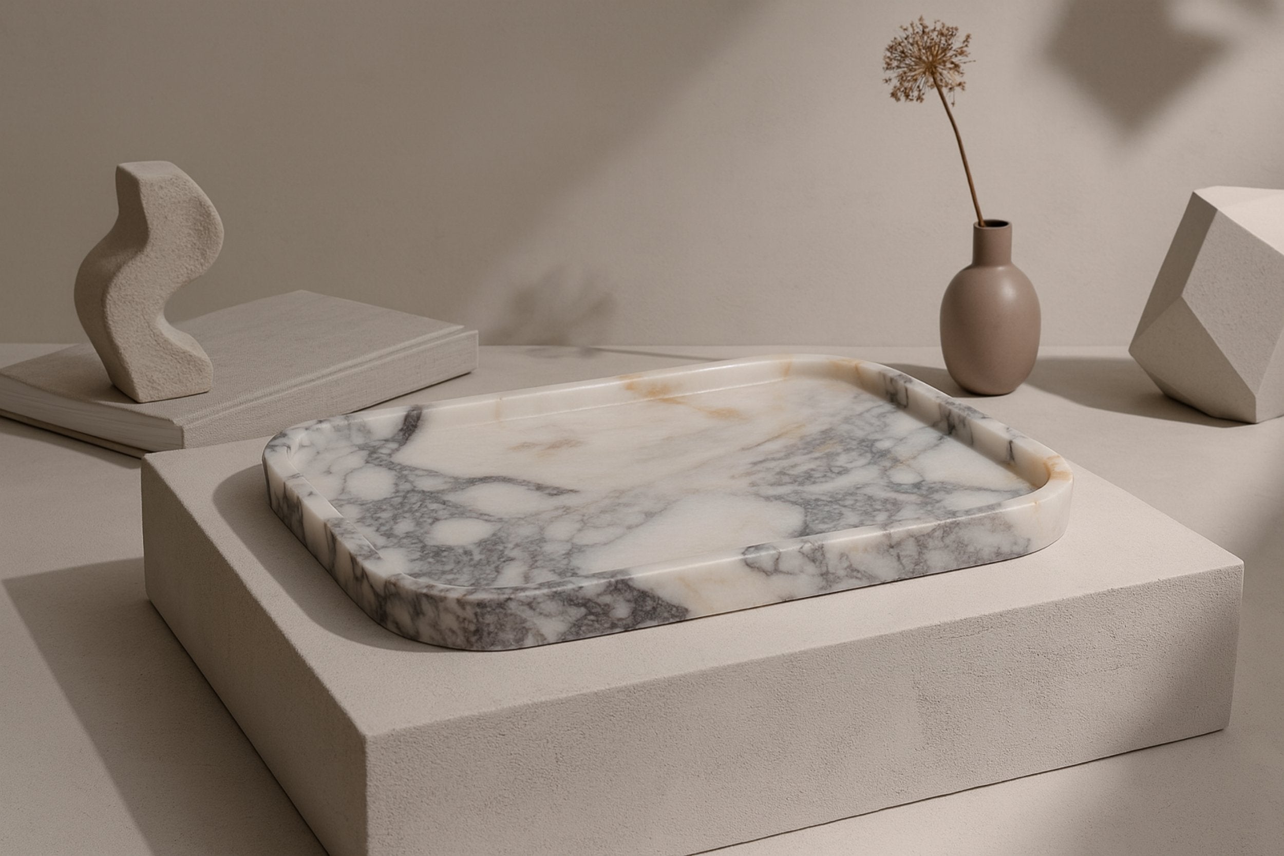 Calacatta Viola marble tray styled in a minimal Japandi-inspired setting with neutral decor elements
