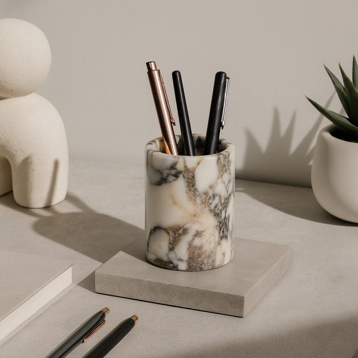 Turkish marble pen holder on minimalist light-toned desk – elegant natural stone décor for modern interiors.