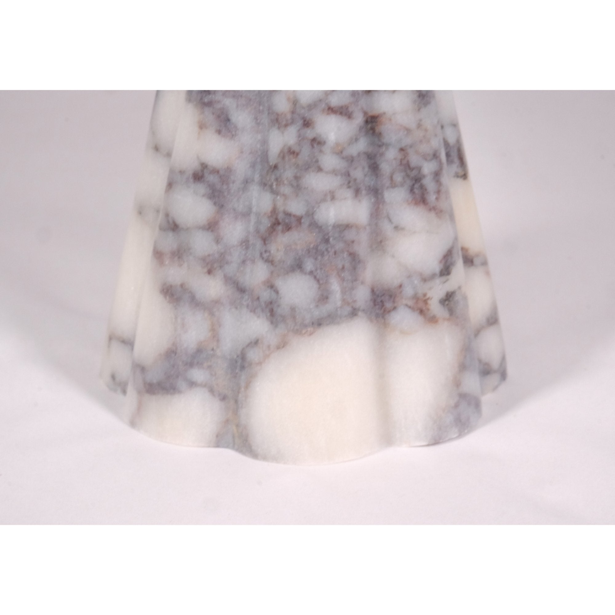 Fluted pedestal base of Calacatta Viola marble bowl