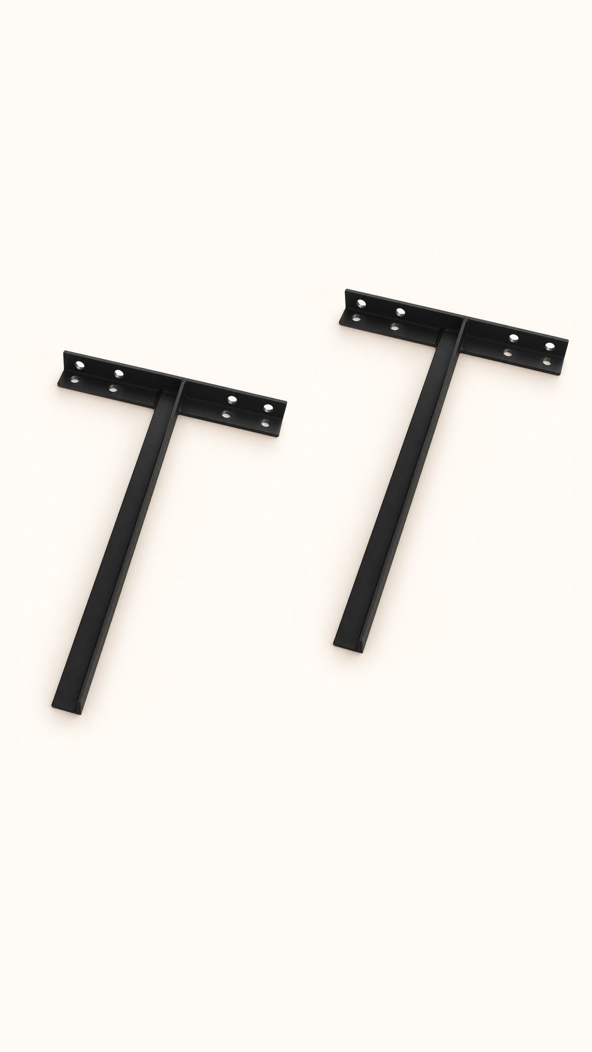 Two black metal T-shaped sink brackets positioned side by side, showing their support arms and drilled mounting crosspieces.