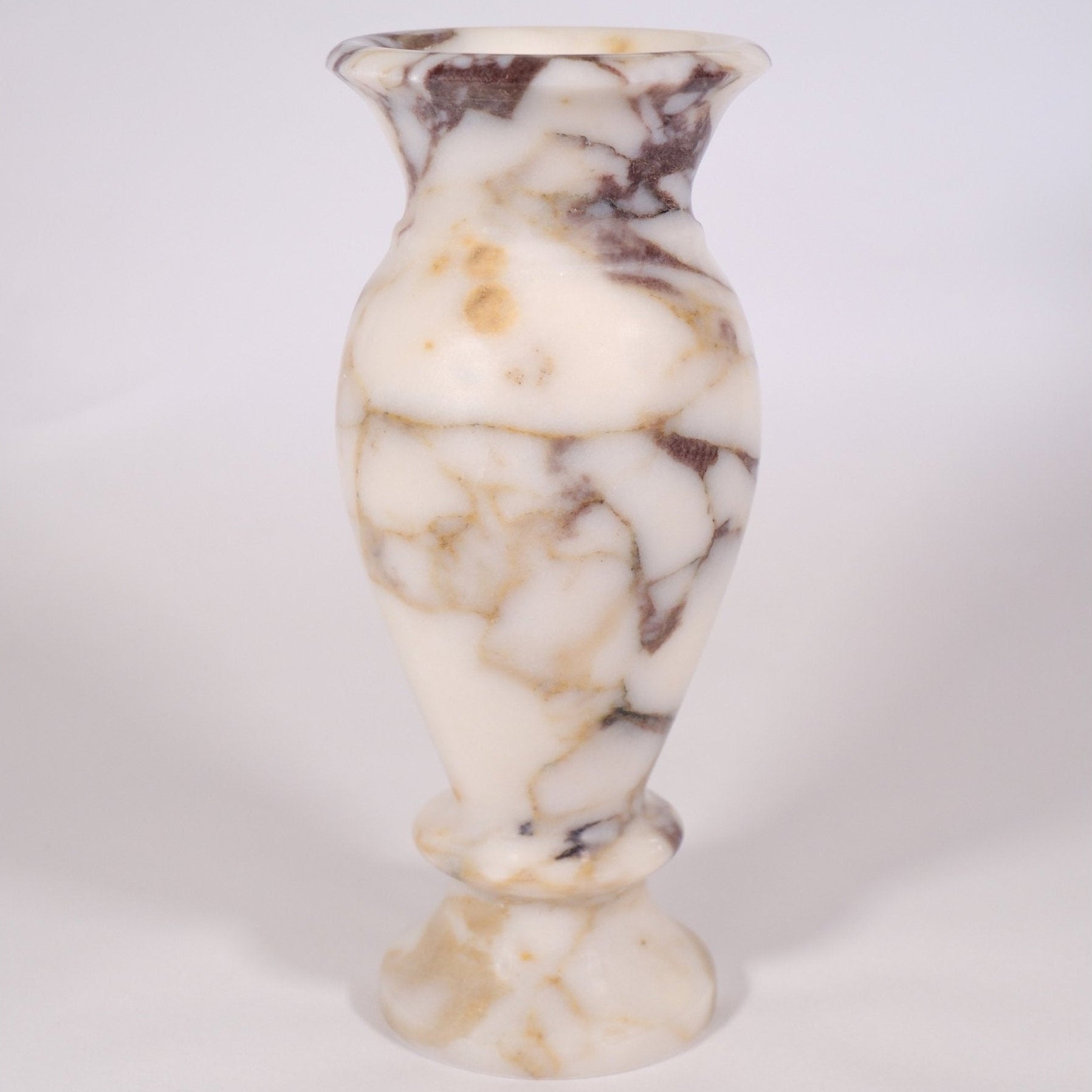Elegant Calacatta Viola marble vase showing natural veining and smooth finish