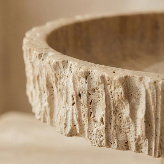 Close up detail of fluted travertine edge texture
