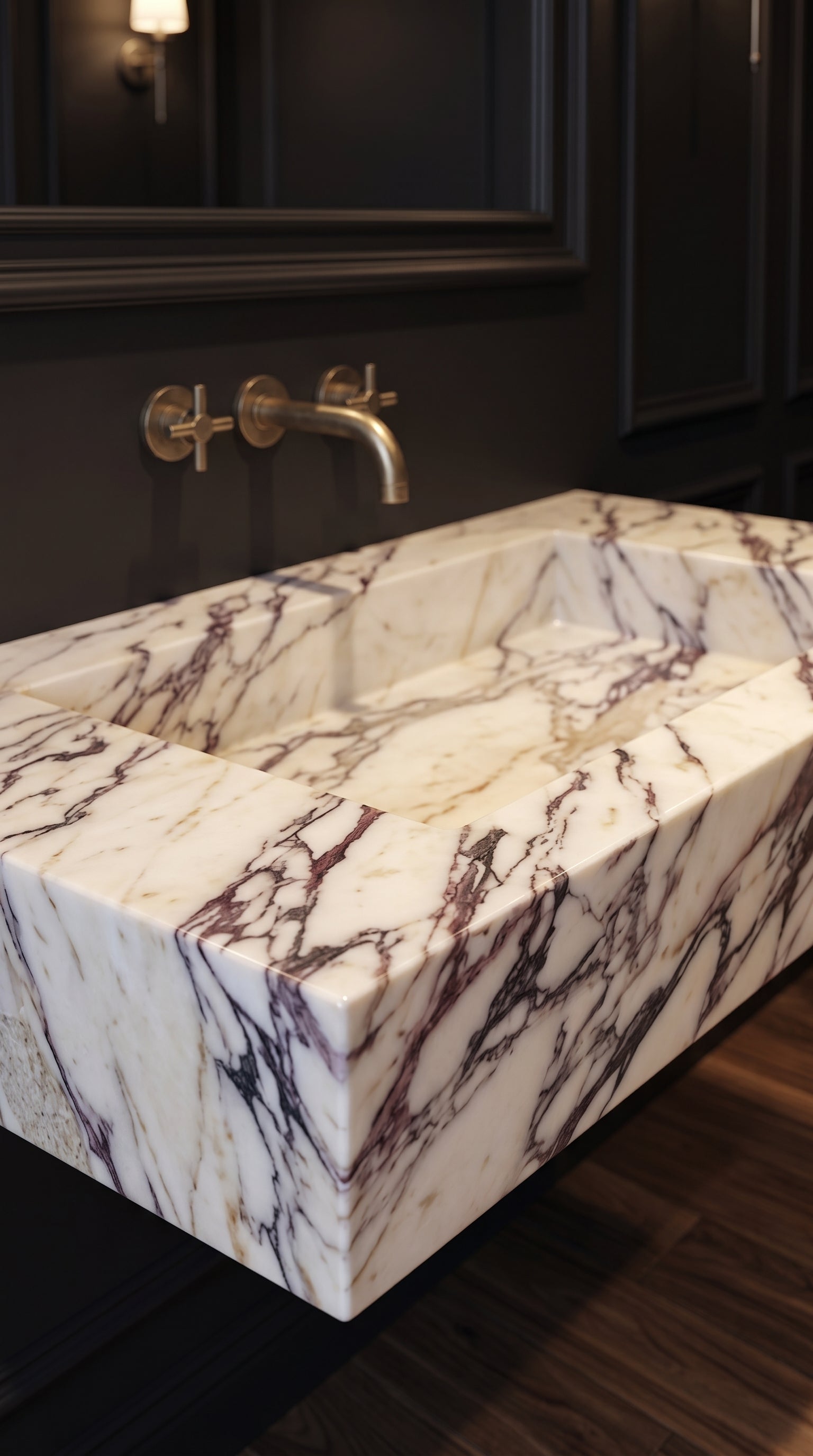 Close-up of Calacatta Viola marble veining and handcrafted sink finish
