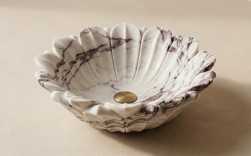 Hand carved marble flower vessel sink, sculptural natural stone bathroom basin with petal design
