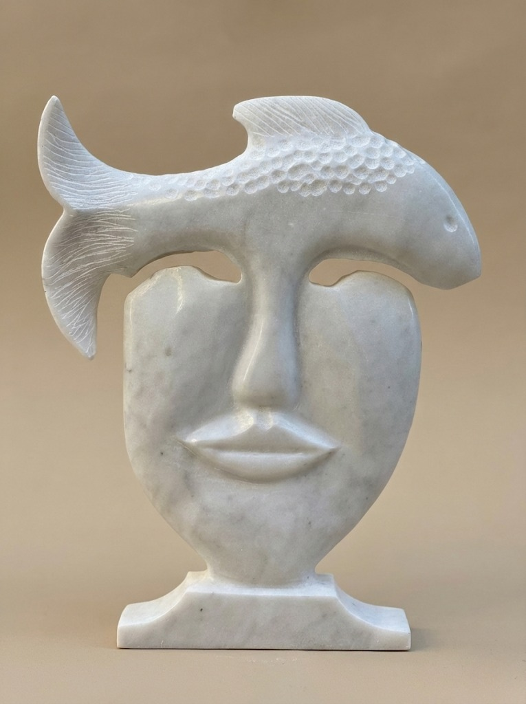 modern marble face sculpture hero shot neutral background