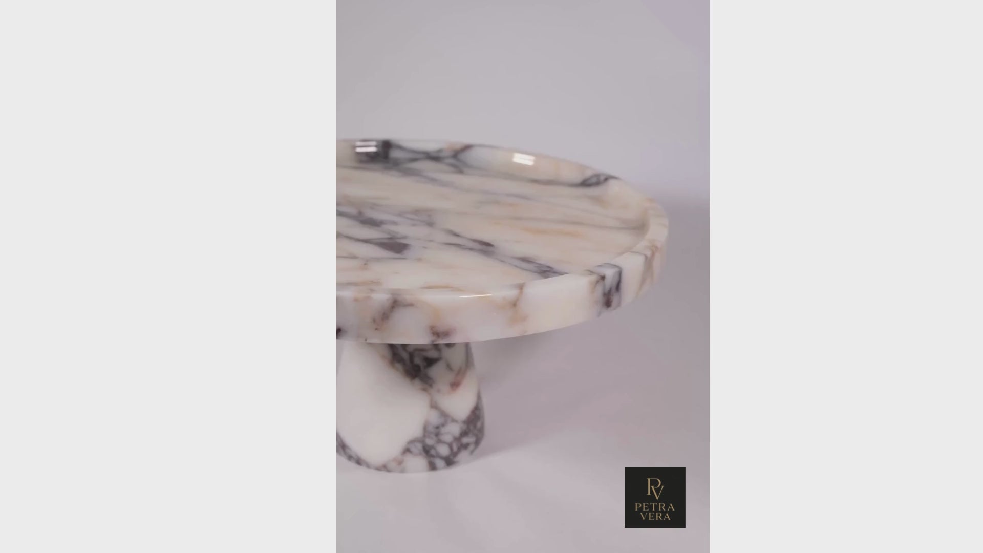 360° view of Calacatta Viola marble pedestal serving bowl, hand-carved luxury cake stand with architectural form