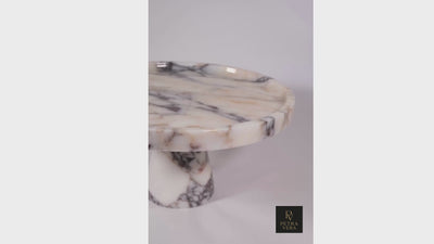 360° view of Calacatta Viola marble pedestal serving bowl, hand-carved luxury cake stand with architectural form