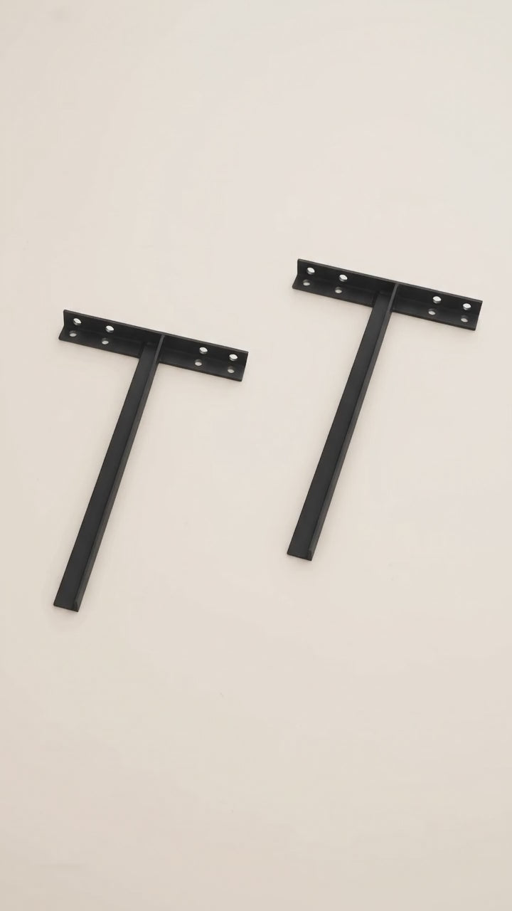 Product slideshow showing a pair of black metal T-shaped sink brackets, a welded joint close-up, and a full view of one bracket.