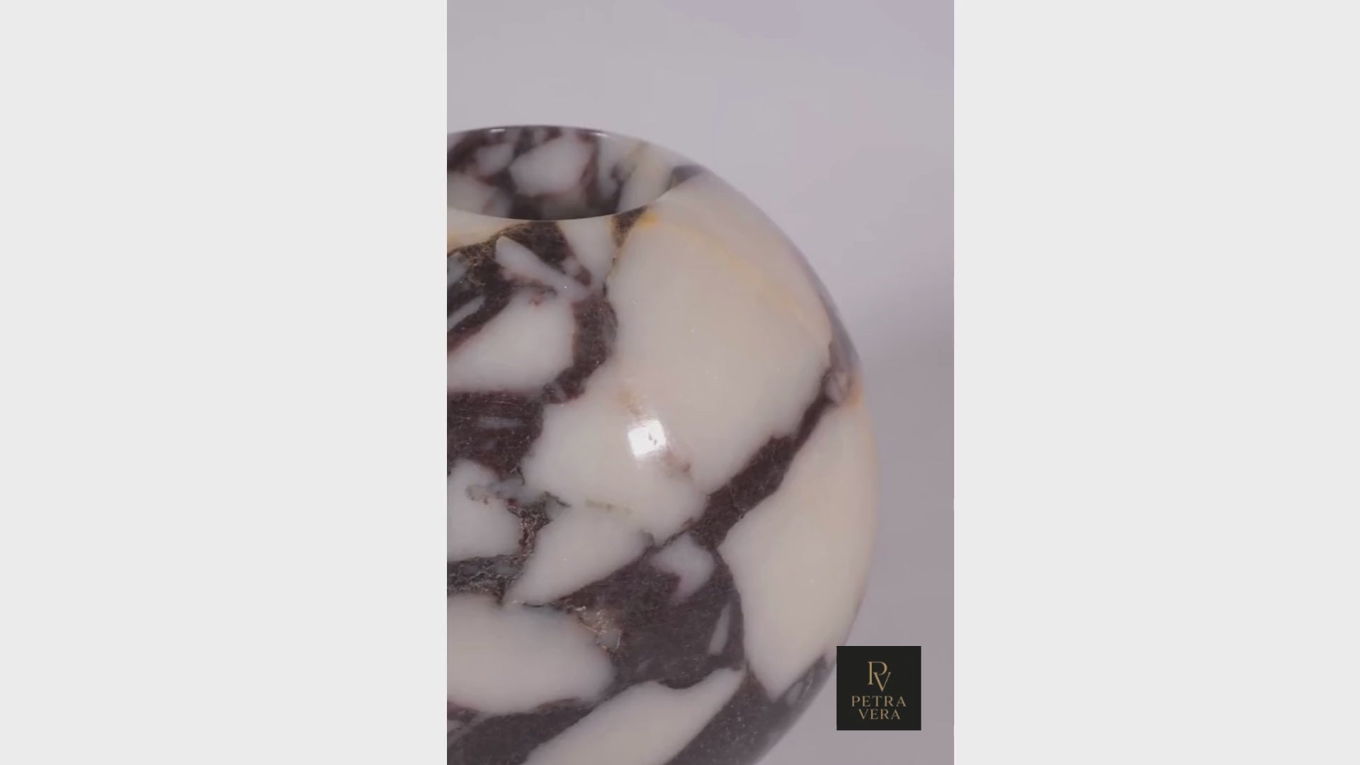 360-degree view of the Round Calacatta Viola Marble Vase, showcasing its hand-polished surface, natural marble texture, and elegant craftsmanship.