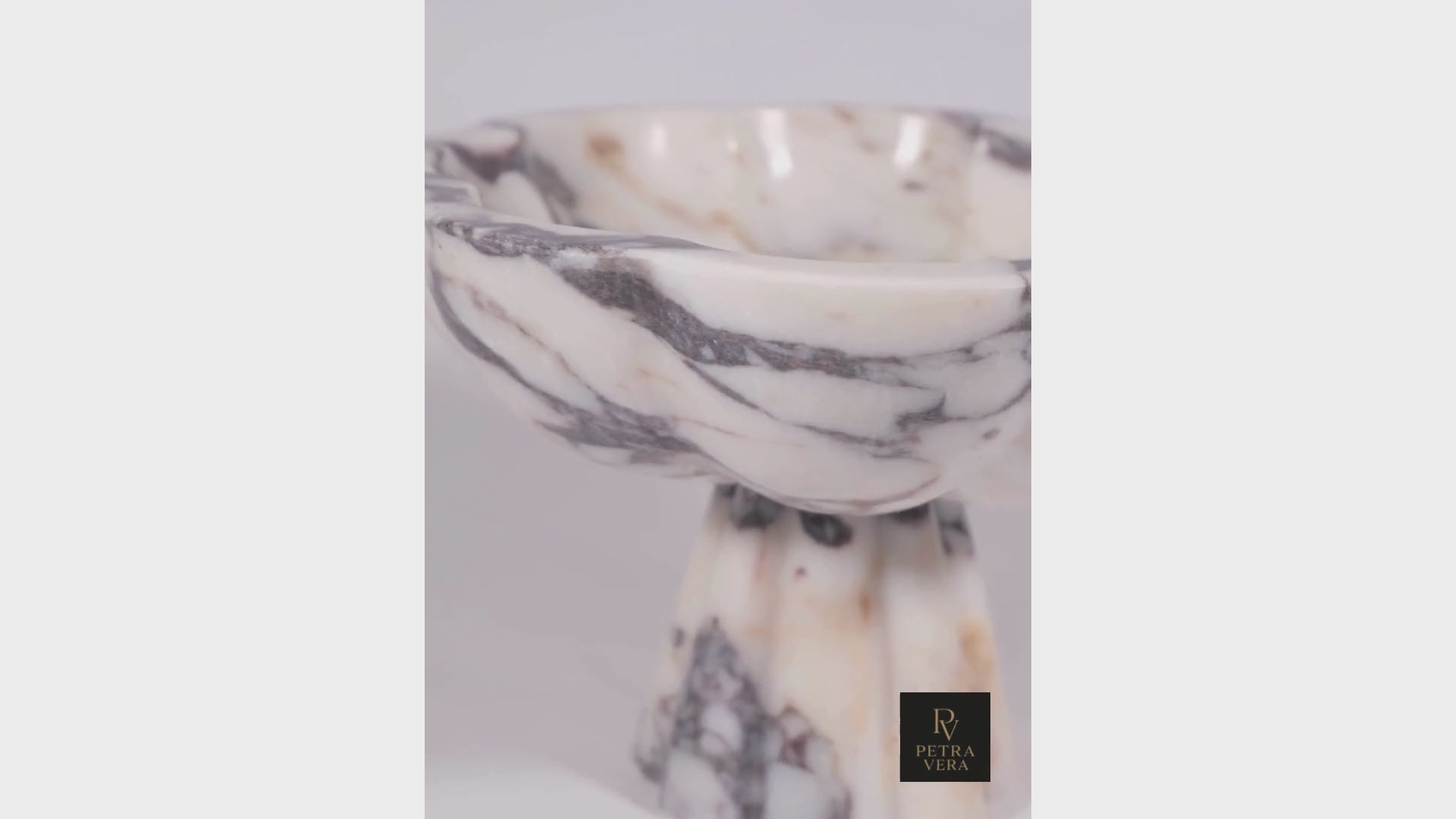 Video showcasing Calacatta Viola marble pedestal bowl — Petra Vera