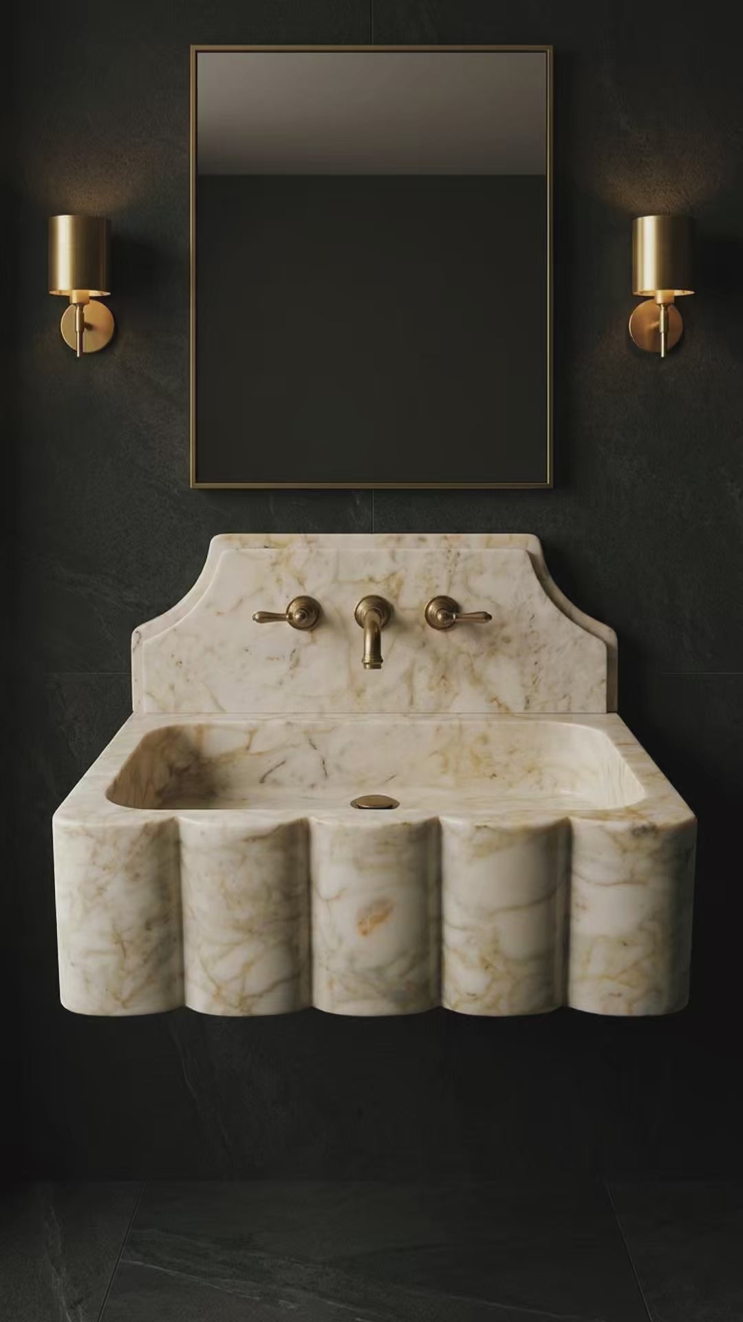 Video showing the handcrafted Calacatta Gold marble sink from multiple angles, highlighting its scalloped front, basin and natural veining.