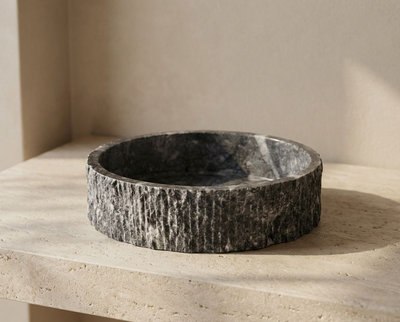 Handcrafted dark grey marble fluted vessel sink rotating product video