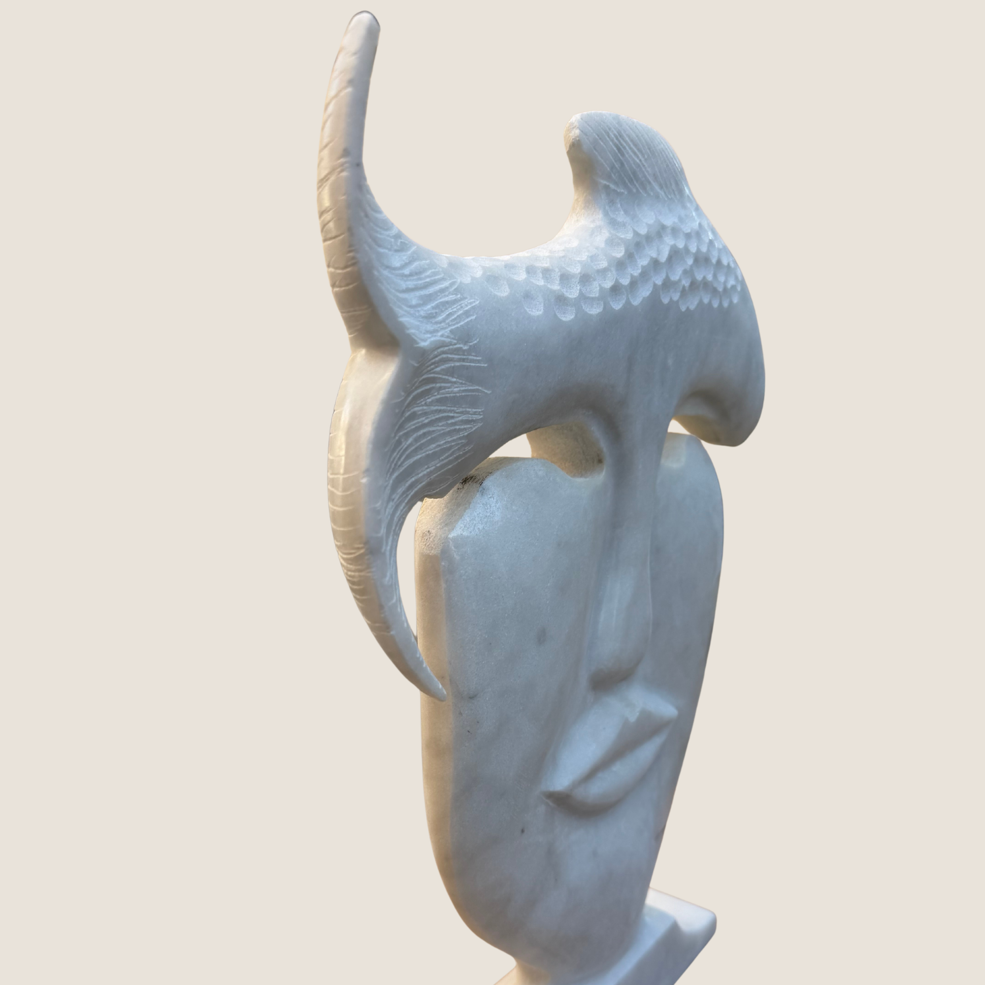 marble face sculpture angled side view sculptural form
