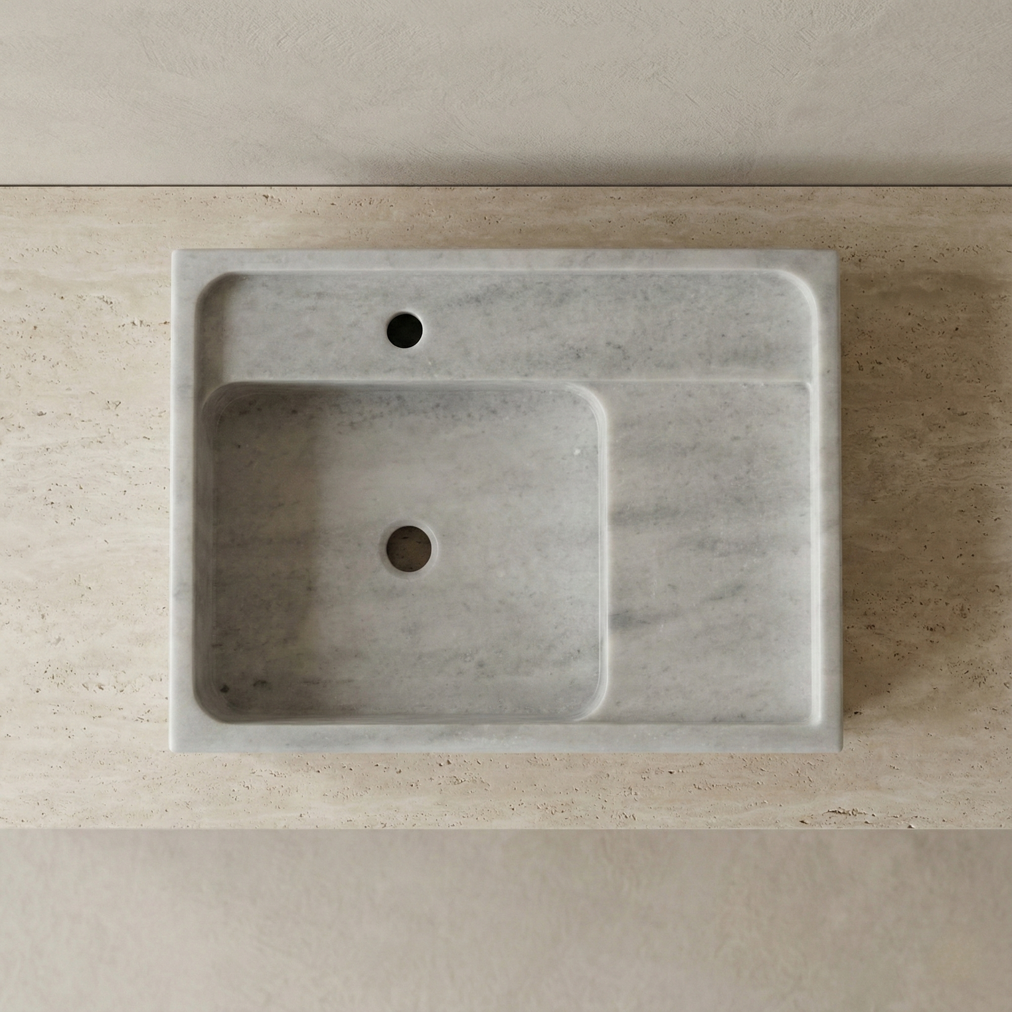 Top view of grey marble vessel sink with rectangular basin and platform design
